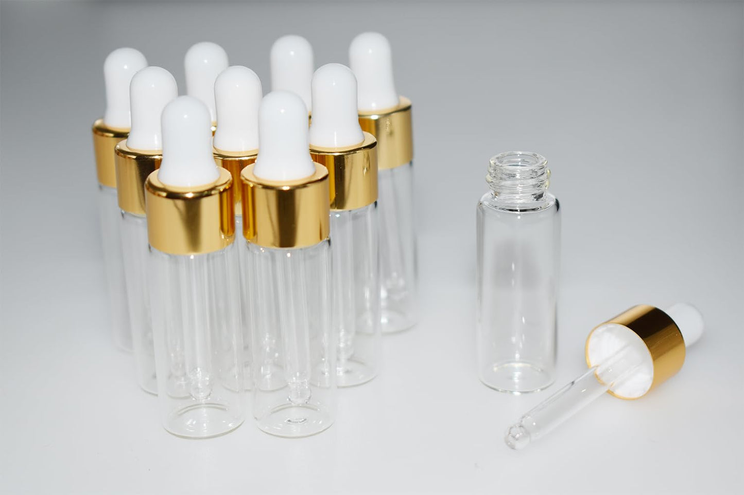 Hustar Small Dropper Bottle, 10pcs 5ml Mini Sample Dropper Bottles Mini Makeup Containers for Travel Liquids Tiny Glass