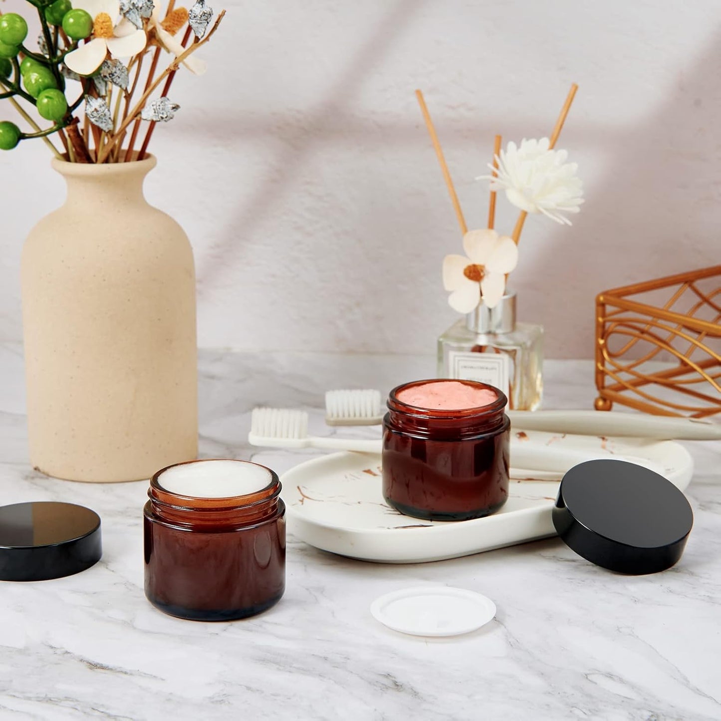 Amber Glass Jars - 24 Pack 2oz Airtight Cosmetic Containers | Round with Black Lids for Lotions & Powders