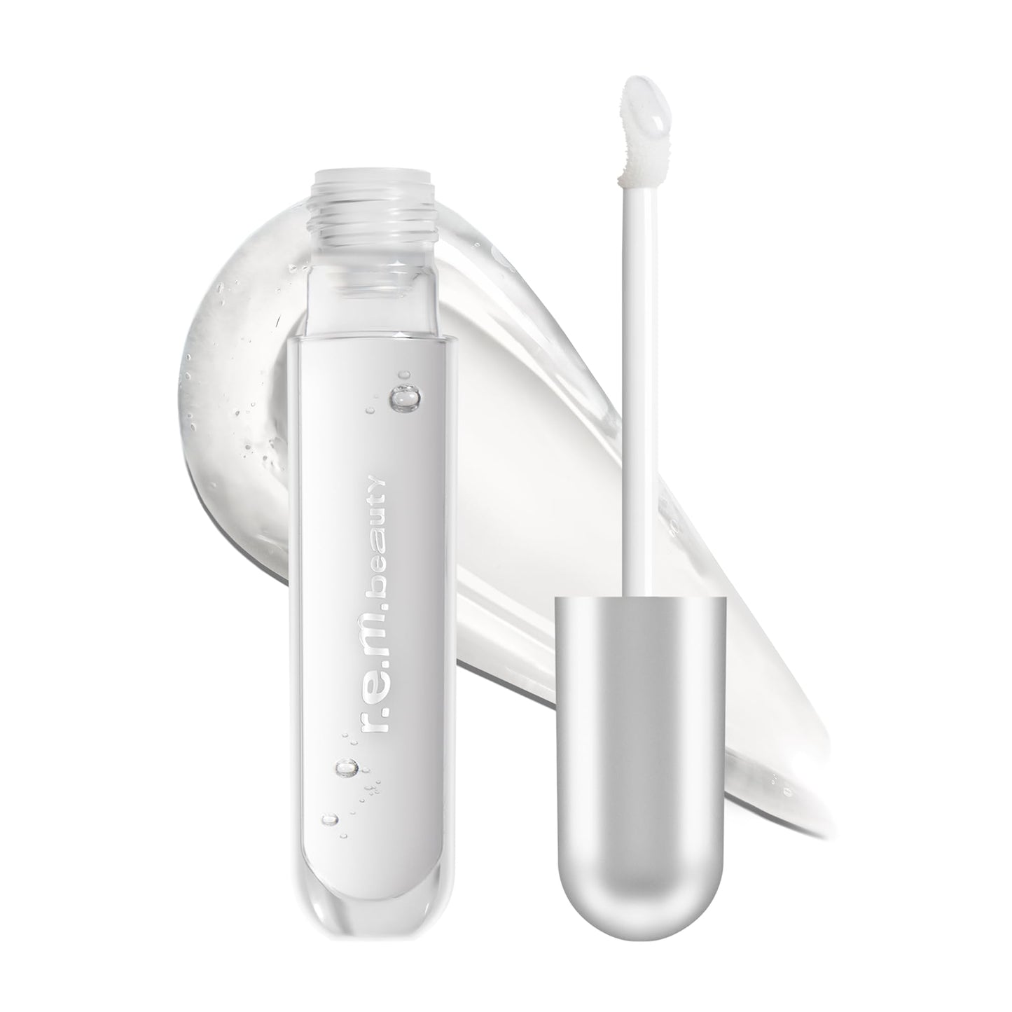 r.e.m. beauty by ariana grande | Essential Drip Glossy Balm in On Ice | High Shine Nourishing Balm | Hydrating Hyaluronic Acid | Smooth Glossy Finish