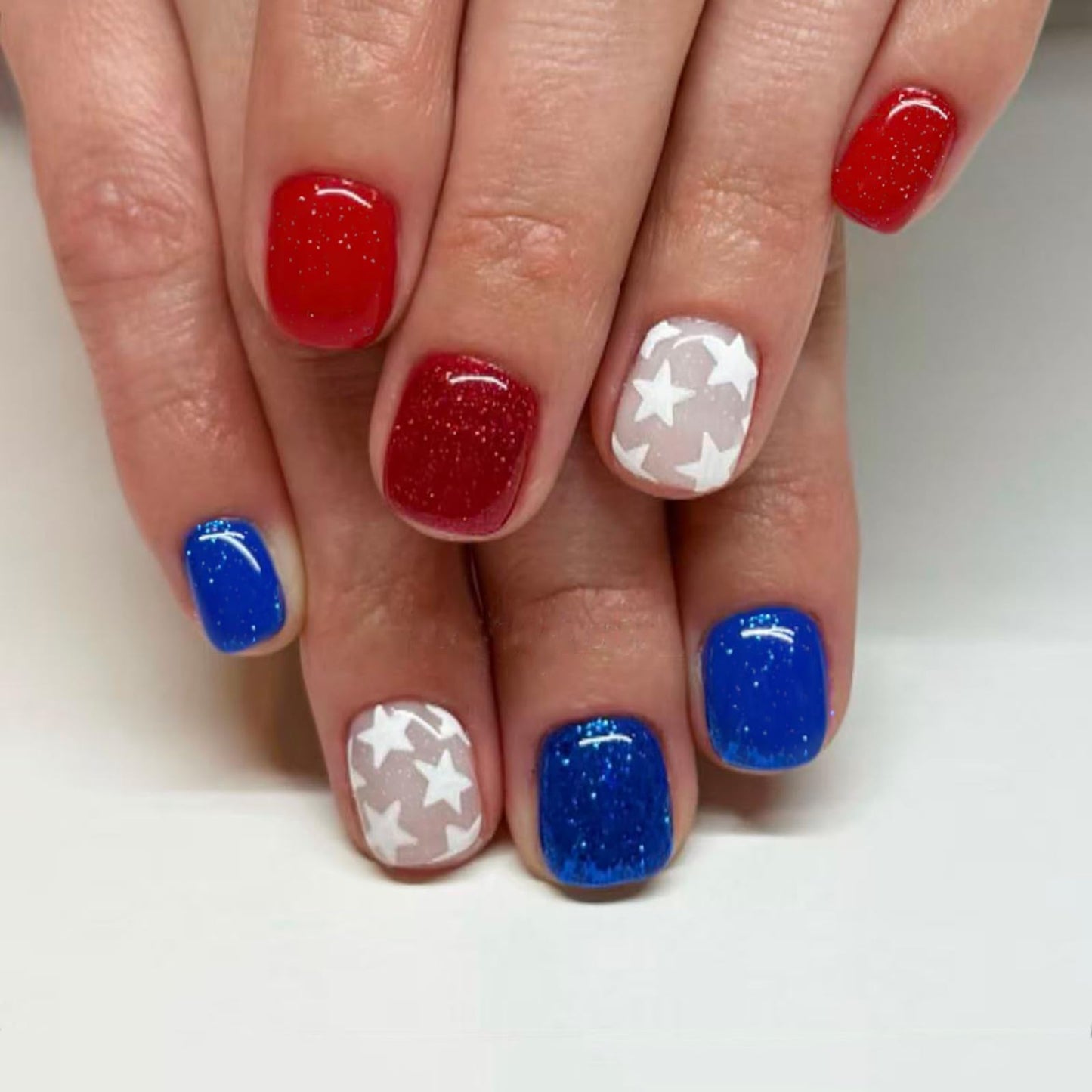 4th of July Press on Nails Short Square Fake Nails Red Blue Glitter Glue on Nail with Star Designs Independence Day Press ons Stick on Nail 4th of July Nails for Women Manicure 24Pcs