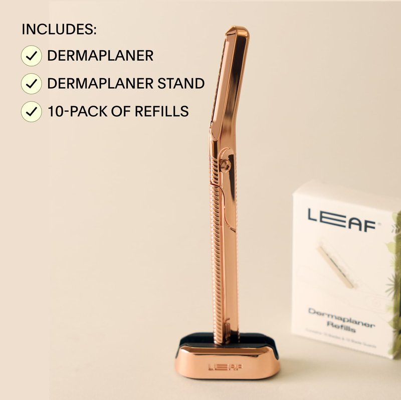 Leaf Shave | Leaf Dermaplaner Kit, All-Metal Reusable Dermaplane Razor and Exfoliating Tool for Women, Includes Matching Stand and 10-Pack of Refills - Gold