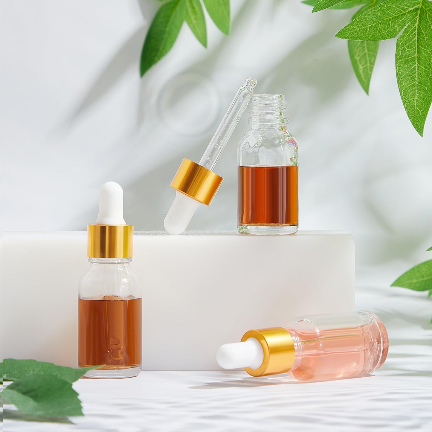 Didaey 100 Pcs 1/2/3/5/10/15 ml Mini Glass Oil Dropper Bottle Bulk, Clear Essential Small Empty Bottles Sample Containers Perfume Liquid Vials with Cap for Traveling (15 ml,Champagne Gold)