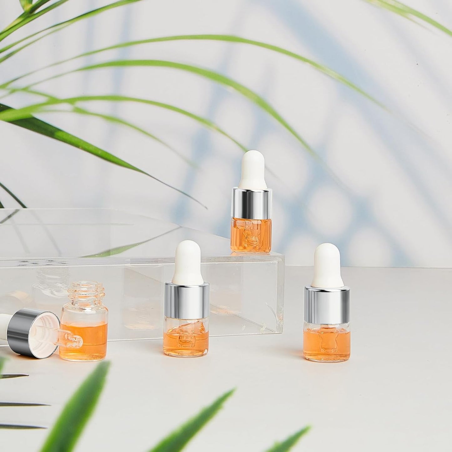 Mini Glass Oil Dropper Bottles - 100 Pcs 1 ml Clear Essential Sample Containers | Travel-Friendly Perfume Vials with Caps