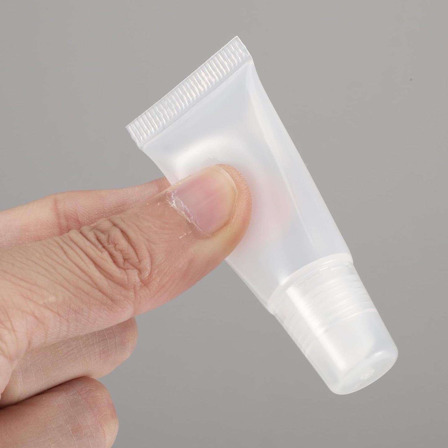 10 Packs Refillable Lip Balm Tube 5ml Empty Lip Gloss Tubes Clear Soft Mini Cosmetic Refillable Lips Gloss Tubes for DIY Lips Base Makeup Travel Toiletries