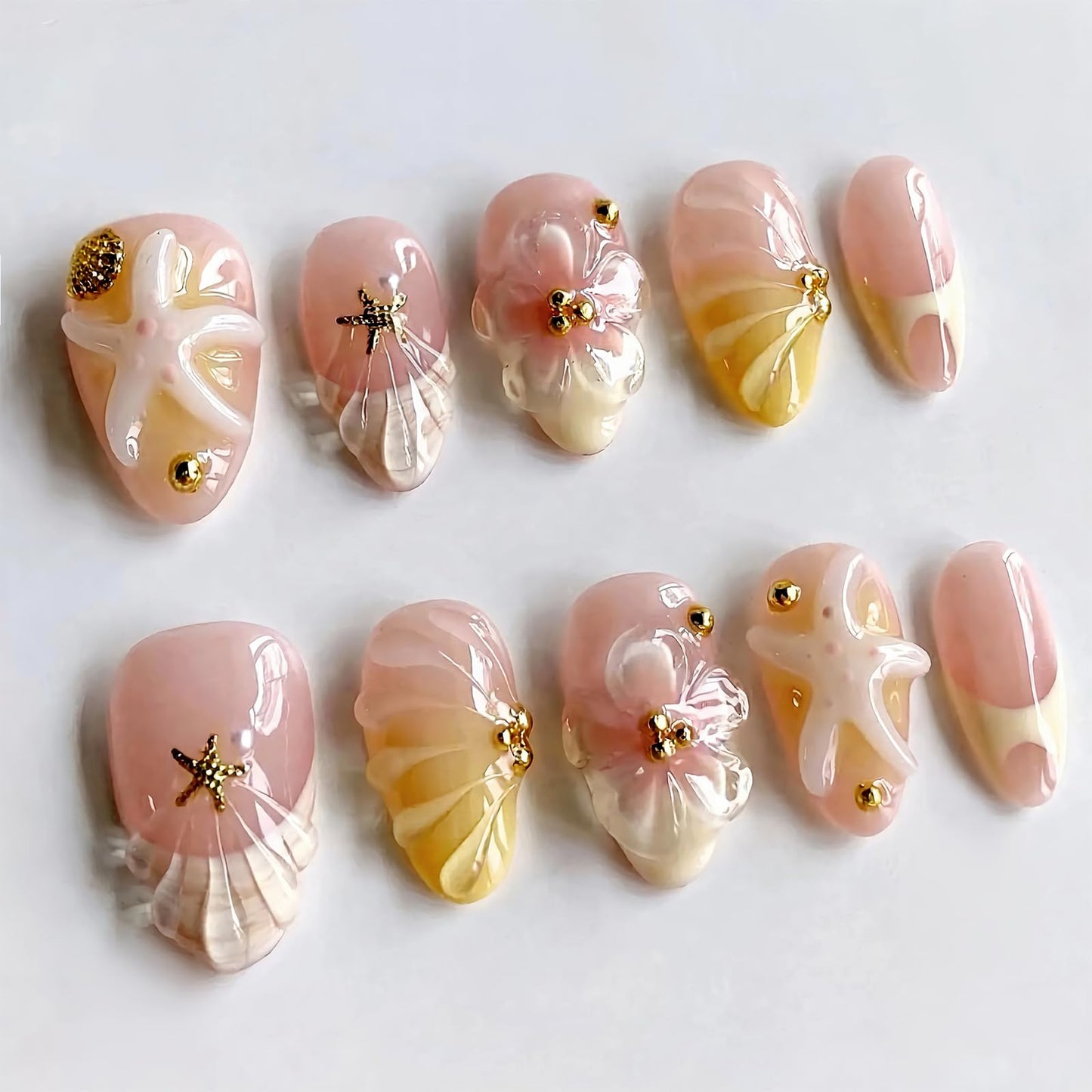 NEWSPIED 30 Pcs Handmade Press On Nails Short Almond Summer Beach Fake Nails with 3D Flower & Gold Starfish Shell Charms Design Glossy Nude Pink Acrylic Nails Reusable Glue On Nails Kit for Women DIY