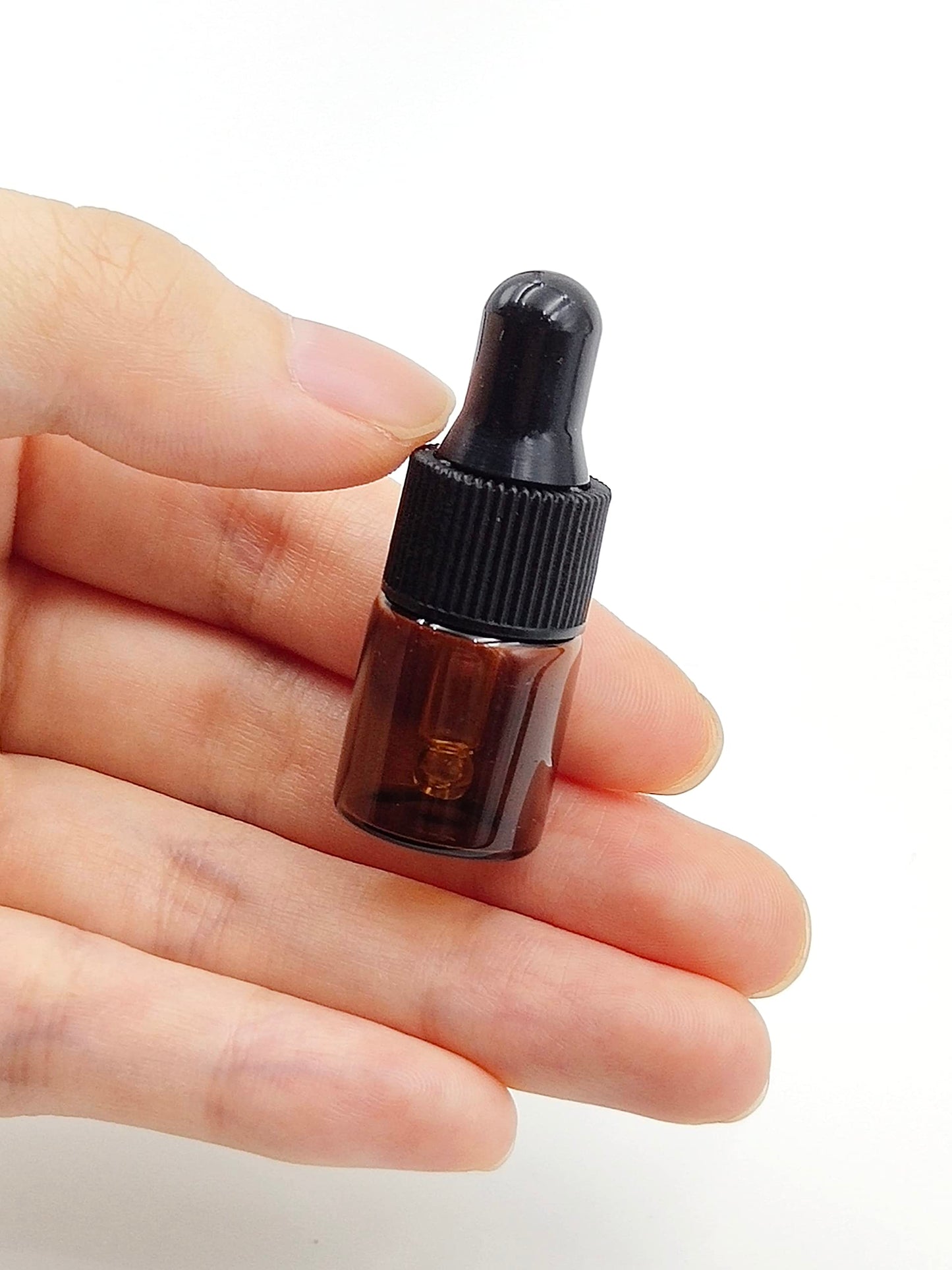 YYNGJCK 15Packs 2ml Tiny Amber Glass Mini Dropper Bottles for Essential Oils, Cosmetics, and Liquid Small Empty Travel Sample Vials with Dropper and Black Caps
