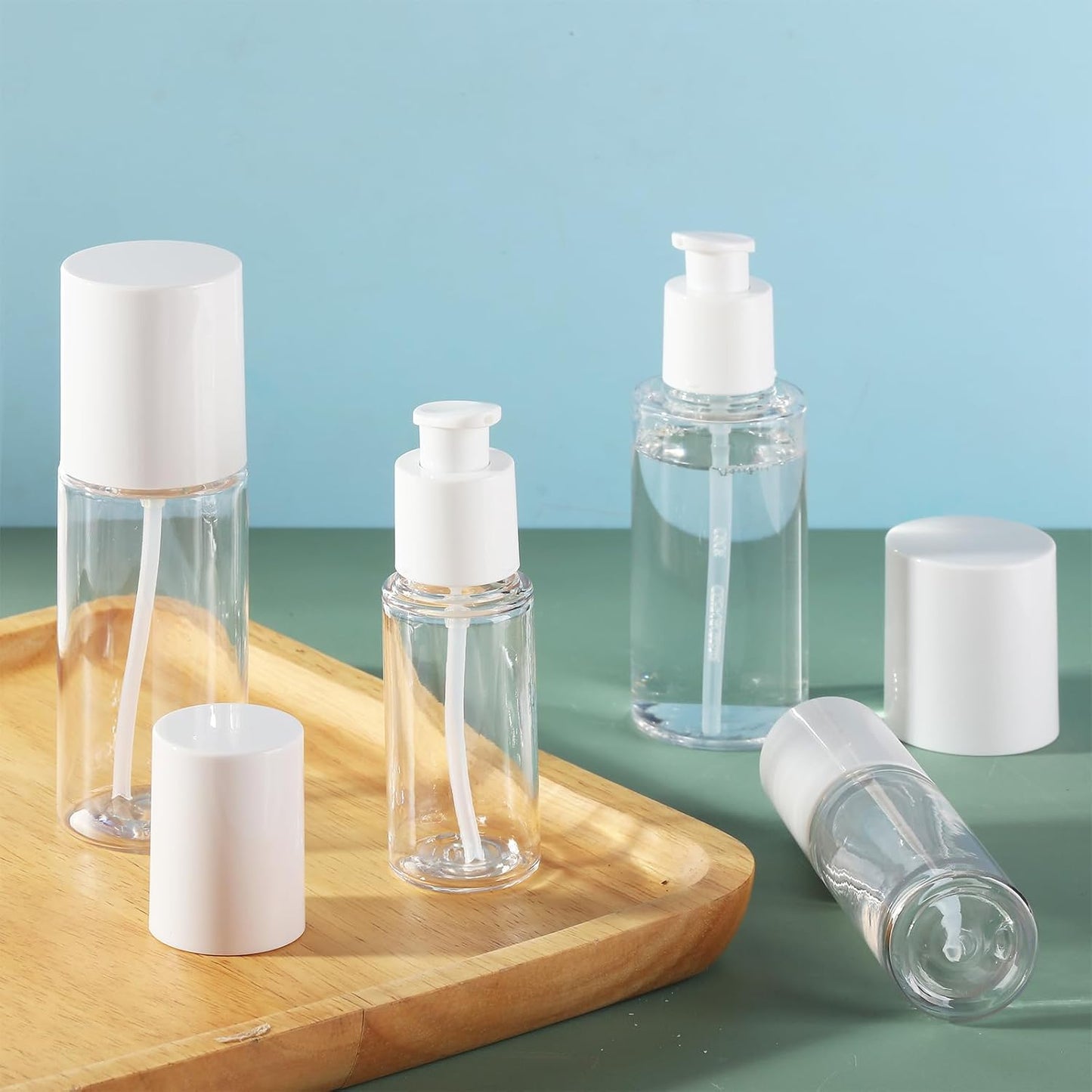 Travel Pump Bottle Set - 2 Refillable Clear Lotion Containers for Cream & Essential Oils | Perfect for Travel & Bathroom Use