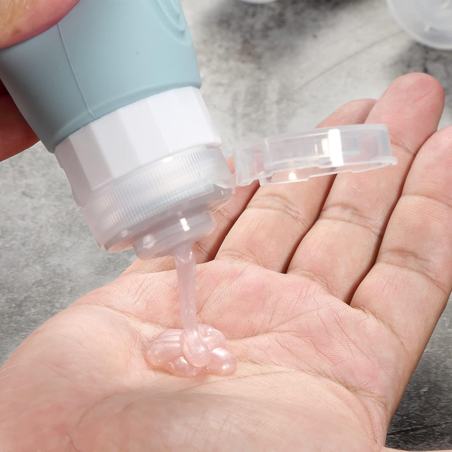 Travel Bottles for Toiletries - TSA Approved 3oz BPA Free Silicone Containers | Leak-Proof & Refillable (4 Pack)