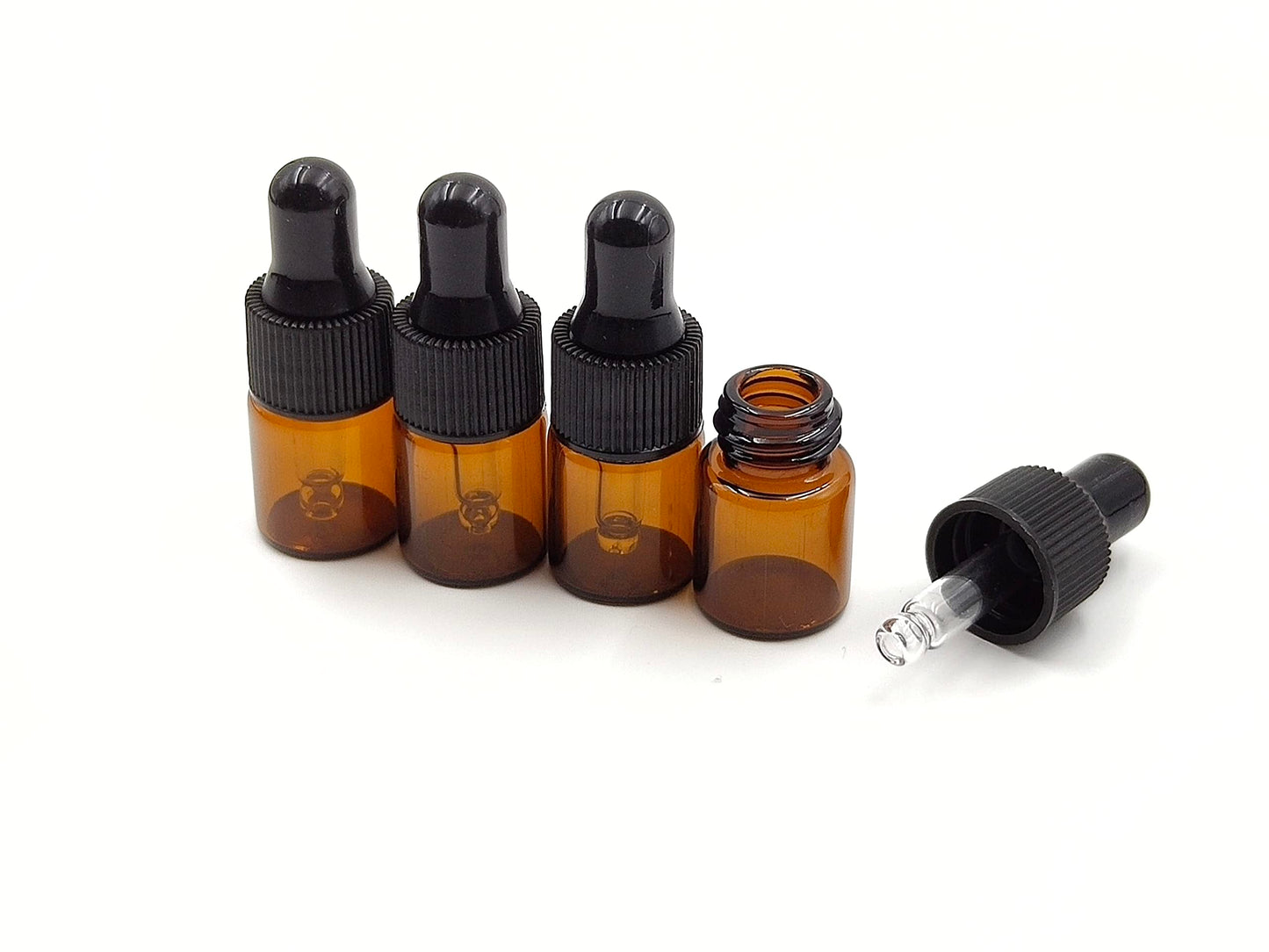 YYNGJCK 15Packs 2ml Tiny Amber Glass Mini Dropper Bottles for Essential Oils, Cosmetics, and Liquid Small Empty Travel Sample Vials with Dropper and Black Caps