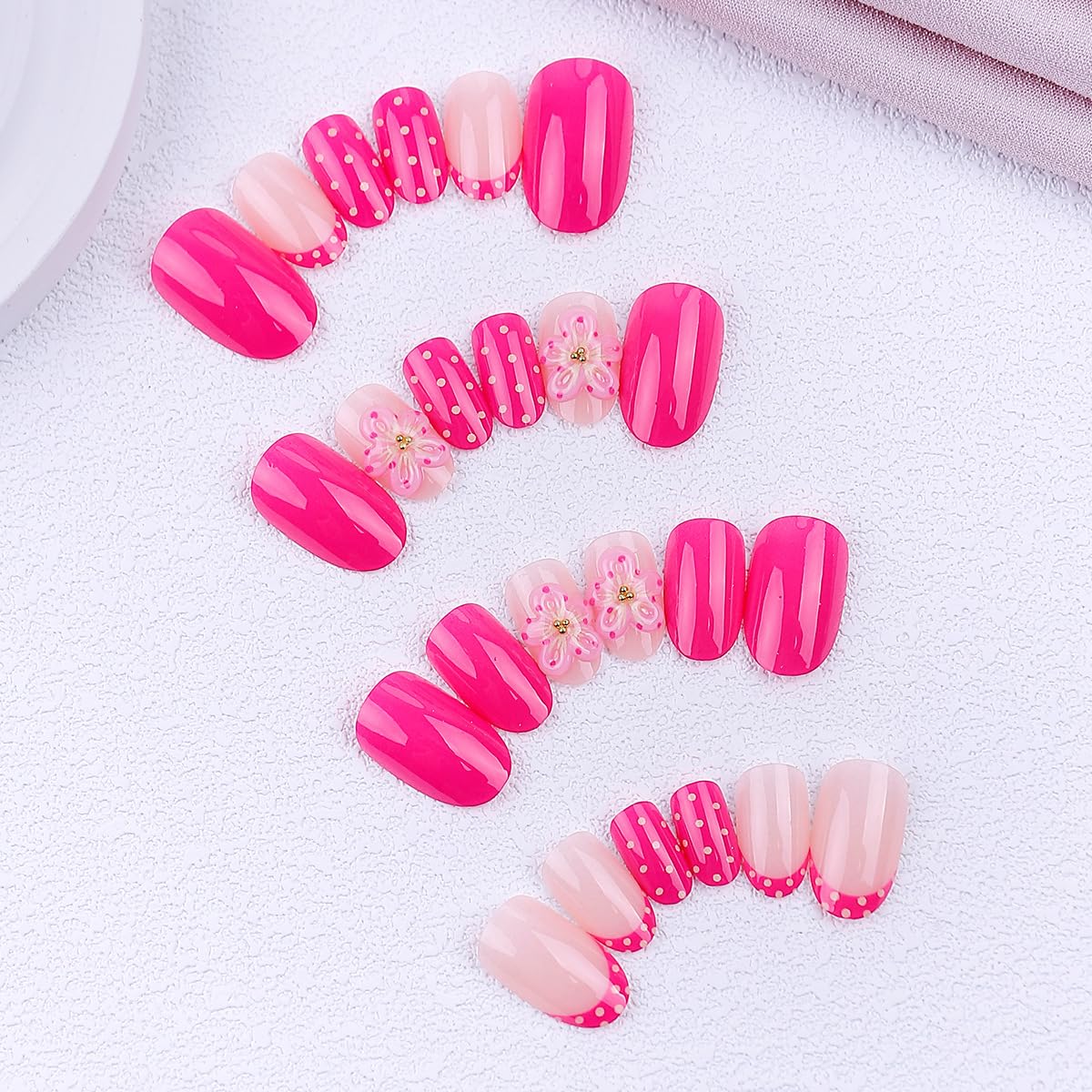 LRKNNO Short Almond Press on Nails Hot Pink Fake Nails with Polka Dot Design 3D Flower Acrylic Nails Reusable Full Cover Glue on Nails Cute Pink French Tip False Nails for Women Girls Daily Wear 24Pcs