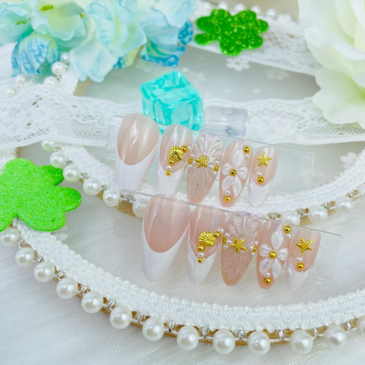 Almond French Tip Press on Nails Medium Fake Nails Glossy Nude Pink Stick on Nails with 3D Gold Balls Starfish Shell Charms Design White French Tip False Nails Flower Acrylic Nails for Women 24 Pcs