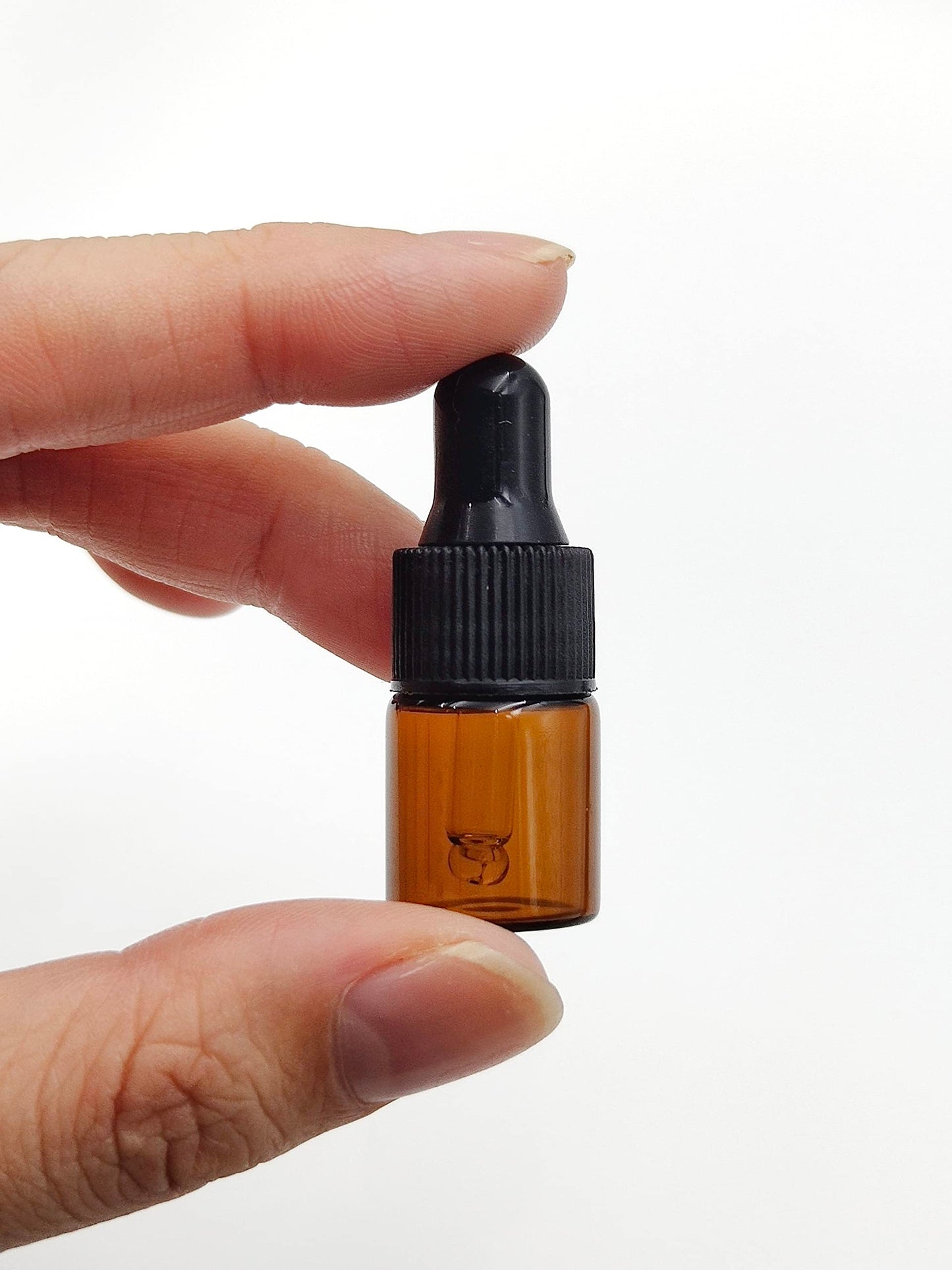 YYNGJCK 15Packs 2ml Tiny Amber Glass Mini Dropper Bottles for Essential Oils, Cosmetics, and Liquid Small Empty Travel Sample Vials with Dropper and Black Caps