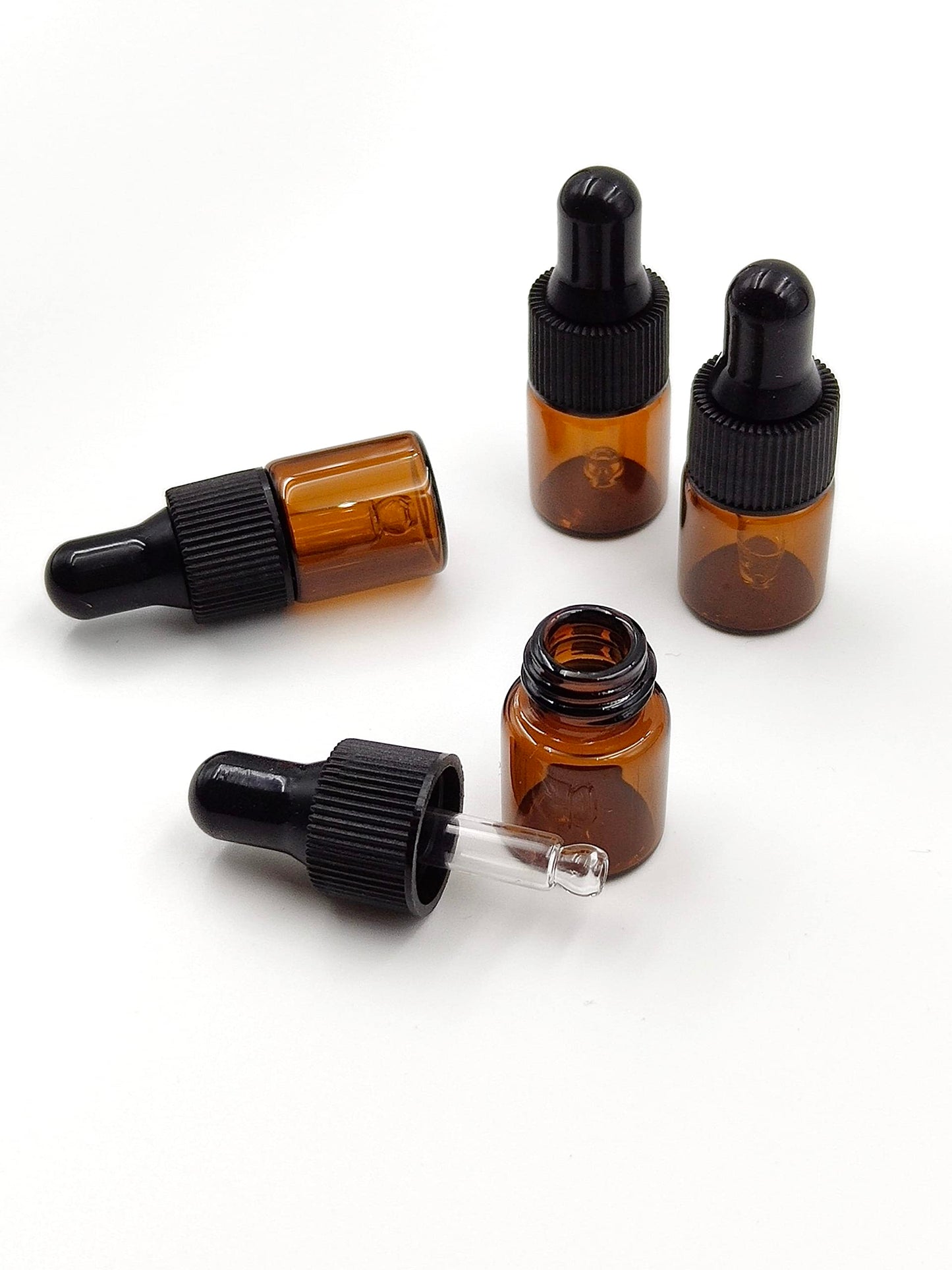 YYNGJCK 15Packs 2ml Tiny Amber Glass Mini Dropper Bottles for Essential Oils, Cosmetics, and Liquid Small Empty Travel Sample Vials with Dropper and Black Caps
