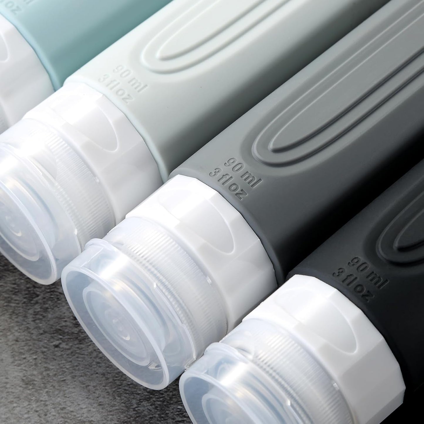 Travel Bottles for Toiletries - TSA Approved 3oz BPA Free Silicone Containers | Leak-Proof & Refillable (4 Pack)
