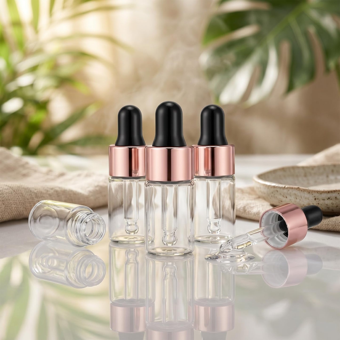 Bremorou 15 Pcs 3ml Mini Glass Dropper Bottle for Essential Oil Small Clear Sample Dropper Vails with Rose Gold Caps Makeup Containers for Essence Liquid Cosmetic Containers