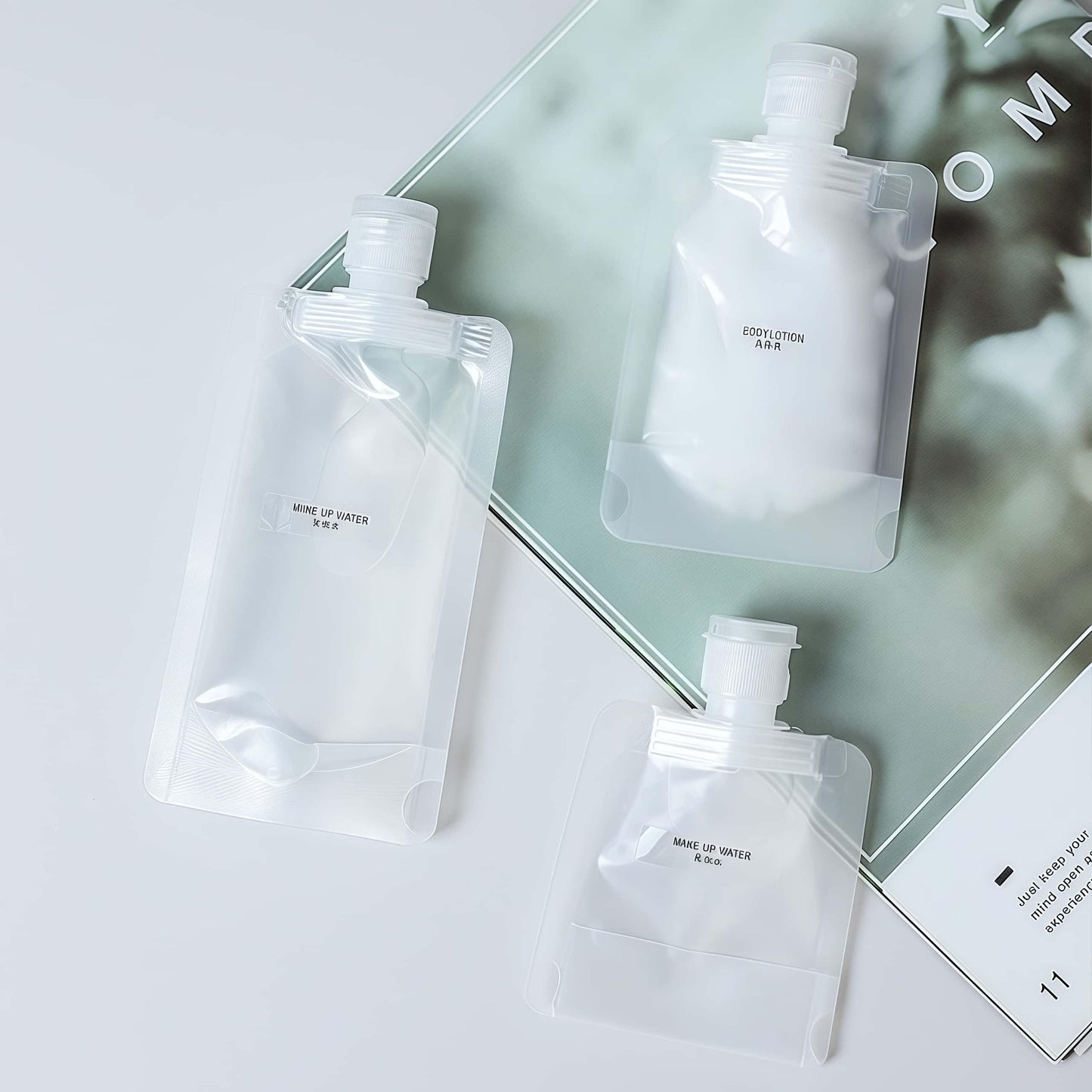 MAAYKOM 10 Pack Travel Pouches for Toiletries, Size Portable Containers,Stand Up Pouch,Refillable Travel Accessories for Shampoo Conditioner (100ML/3.4OZ/10piece)
