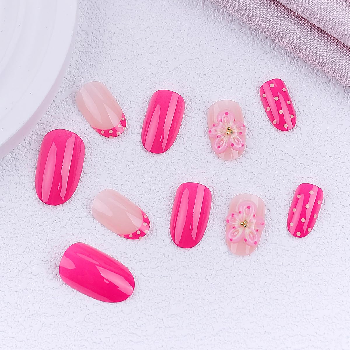 LRKNNO Short Almond Press on Nails Hot Pink Fake Nails with Polka Dot Design 3D Flower Acrylic Nails Reusable Full Cover Glue on Nails Cute Pink French Tip False Nails for Women Girls Daily Wear 24Pcs