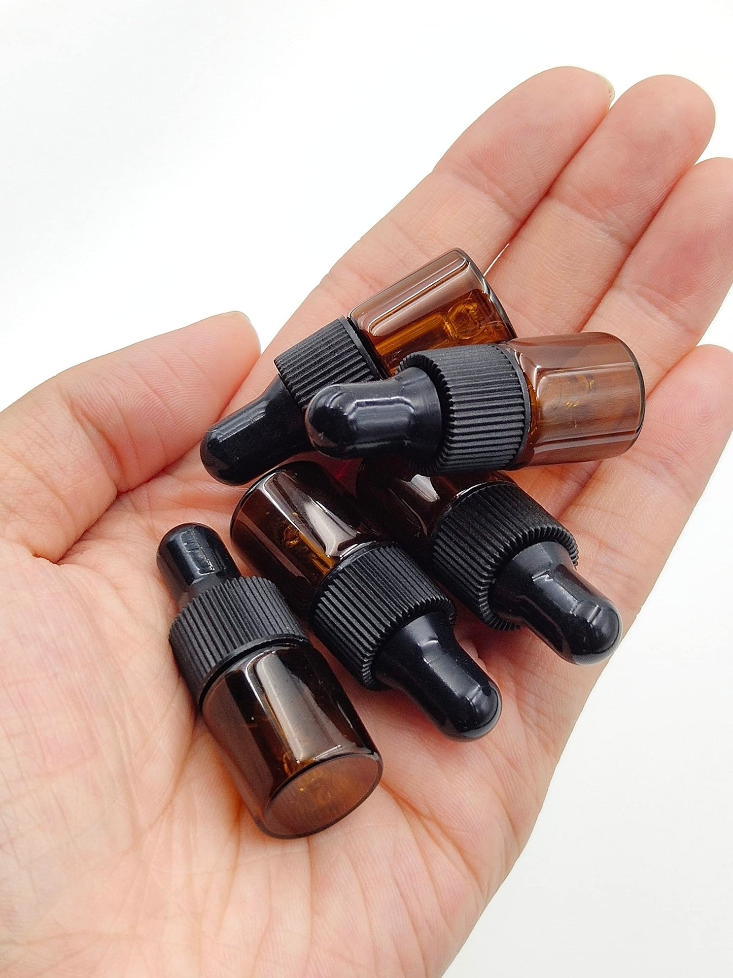 YYNGJCK 15Packs 2ml Tiny Amber Glass Mini Dropper Bottles for Essential Oils, Cosmetics, and Liquid Small Empty Travel Sample Vials with Dropper and Black Caps