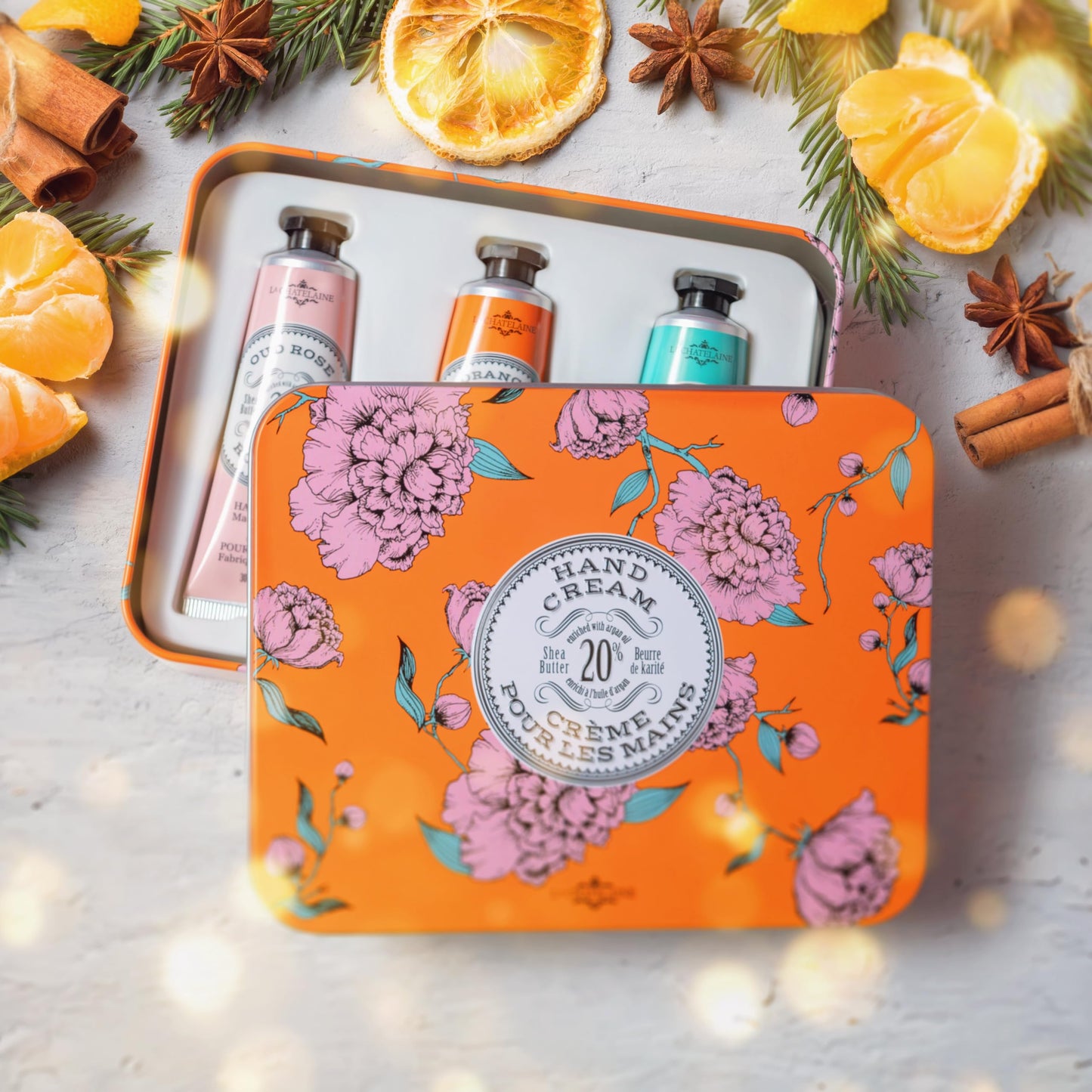 La Chatelaine Hand Cream Trio Tin, Gifts for Mom, Natural Hand Lotion Gift Set, Made in France 20% Organic Shea Butter (Gardenia, Cinnamon Orange, Passion Fruit or Orange, Oud Rose) 3 x 1 fl. oz