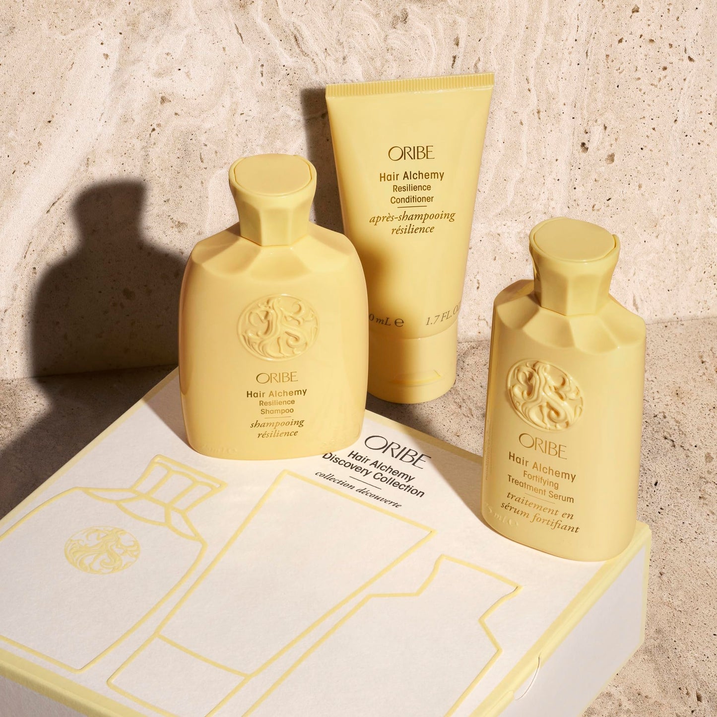 Oribe Hair Alchemy Discovery Travel Set - Prevents Breakage & Strengthens Weak, Fragile Hair - Hydrates & Softens - Strengthening Shampoo (2.5 oz), Conditioner (1.7 oz) & Serum (2.5 oz)