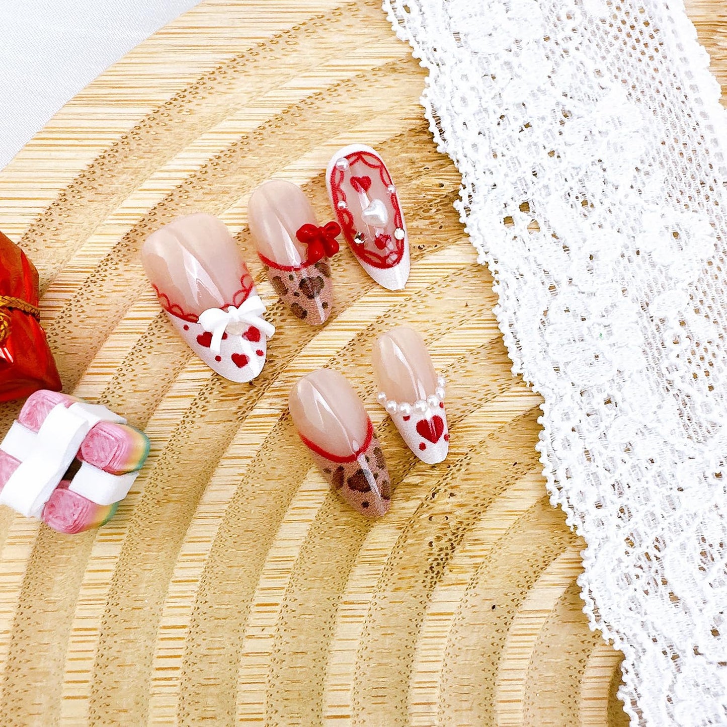 Leopard Print Press-On Nails - 30 Pcs Medium Almond Acrylic with Heart Pearl Bow & Rhinestones | Romantic Valentine’s French Tip Design